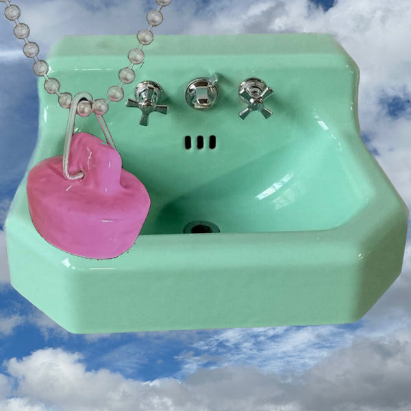 Nonbinary Sterling Silver Handmade, Hand-Enameled Barbie Pink Sink Stopper is 1" x 3/8" approximately and is hand-signed on the hollow inside. Comes with special gift wrapping--even if you are gifting yourself  For the record, Pink has ALWAYS been my favorite color. I owned a pink house, had another house with a pink kitchen and a 1965 pink T-Bird.    