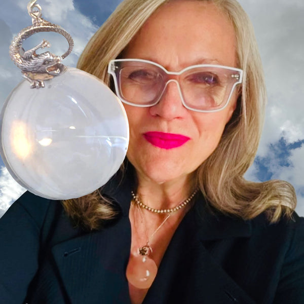 Lucite "Crystal Ball" &nbsp;and Sterling Silver Dragon Orb. Dragon-5/8". Orb-1-3/8". Crystal Ball with Sterling Silver dragon sitting on top of the world! Fables faux "Mystical Jewelry". If you are looking for a fun way to have a crystal ball... Plexiglass "crystal" Ball suspended by a Sterling Silver Dragon. Hand Made in America. Hand Signed. Comes with long leather cord or Vintage looking ribbon.