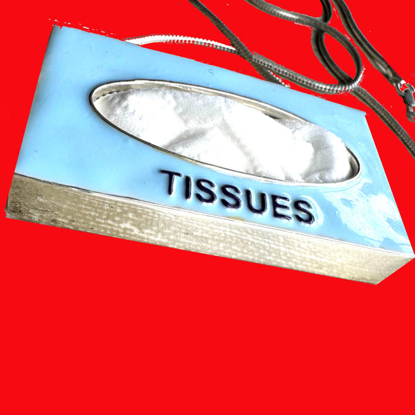 Got a tissue hanging" around? You do if you are wearing this POP ART Sterling silver Hand-Enameled Baby  Blue Tissue Box necklace!  Nothing to sneeze at!  But maybe something to sneeze WITH! Stick an actual tissue inside and pop it through the opening for fun! (Comes with small pack of travel tissues!)  Baby Blue Sterling Silver Tissue Box with Aubergine letters "Tissues" is approximately 1-3/8" x 1-1/4" x 3/8" with Sterling SilverSnake Chain attached.  
