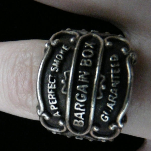 Vintage antique cuban cigar bands come to life as Sterling Silver Cigar Band Rings in 3D fashion statements. Shown here on talented musician/composer/recording artist, Paris Carney. O'Neill is her new musical project.And she just opened for Reeve Carney at his new "Truth" solo album record release.
