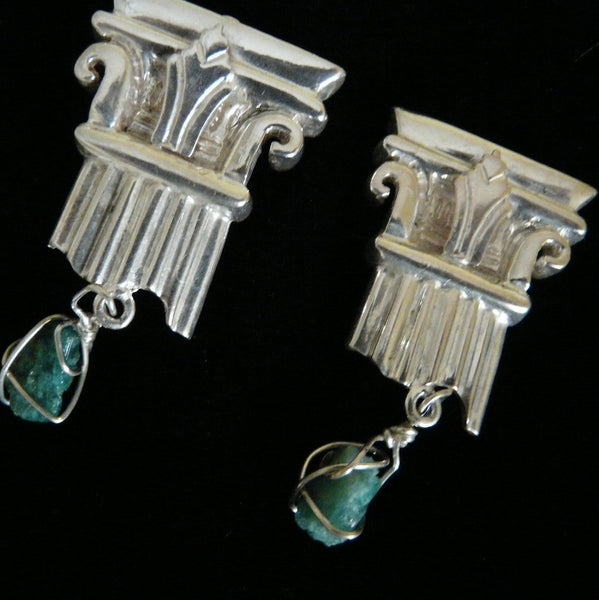 A more delicate version of my Sterling Silver Broken Column earring--THIS one is just the broken TOP, and dangling from it is a chunk of Jade... A more tailored earring for the less bold woman who still likes to make a statement. Perfect for day OR evening wear.   Approximately 1"x 1". Hand made in the USA. Hand signed.  Sterling Silver Broken Column Top Earrings with dangling chunks of Genuine Jade.