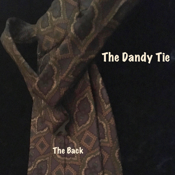 The Dandy Tie.  Each is a ONE OF A KIND and HANDMADE,by me, out of recycled neckties I handpick because of their texture or color or print. Created for men AND women, and designed to be worn for a lifetime, because of their timeless elegance, you are guaranteed to never see another like yours. Completely adjustable, the Dandy Tie is meant to be worn with or without a shirt. Use your own imagination!