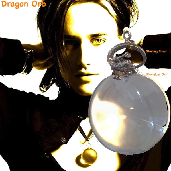 Lucite "Crystal Ball" &nbsp;and Sterling Silver Dragon Orb. Dragon-5/8". Orb-1-3/8". Crystal Ball with Sterling Silver dragon sitting on top of the world! Fables faux "Mystical Jewelry". If you are looking for a fun way to have a crystal ball... Plexiglass "crystal" Ball suspended by a Sterling Silver Dragon. Hand Made in America. Hand Signed. Comes with long leather cord or Vintage looking ribbon.