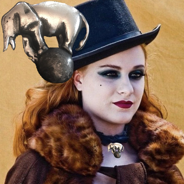 Evan Rachel Woods in Sterling Silver Big Top Elephant on Ball Charm. Approximately 1-1/2” by 1-1/2”. Vintage Oxidized Finish. Handmade in America with love and reverence. Hand signed. Comes with special ribbon or leather cord or you can easily slip any chain of your own through the generous back loop.    A portion of the profits from the sale of this piece will go to savetheelephants.org.