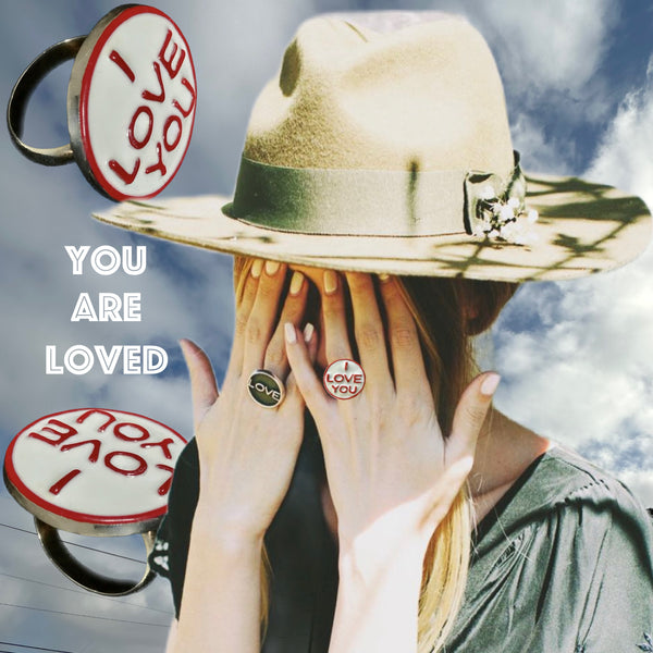 Sterling Silver I LOVE YOU Ring. Offer LOVE into the world! On days you’re feeling insecure, turn it around to face you. Approximately 1 inch in diameter. Custom Handmade and Hand-Enameled, in America. Hand-signed by me.