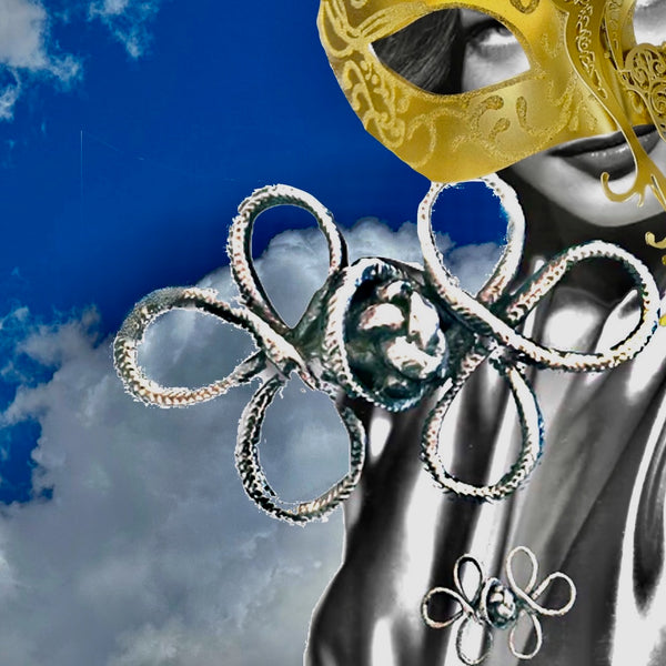 Featured in Avril Lavigne's "I Fell in Love with the Devil" video, consider this timeless piece in lieu of a tie./ From a more genteel time. Sterling Silvr "Frog" Braided Toggle Brooch. Approximately 2-3/4" x 1-5/8" Hand made in America with a story of my own. Hand-signed.  Edit alt text
