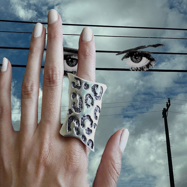  Sterling Silver Seeing Spots Leopard Ring.What can I say about this ring, except that it is PURRRfect? Shades of "Mad Men"! This ring brings back everything wonderful about the mid-60's--there is something simultaneously feminine and masculine about leopard skin. I mean, both Steven Tyler and Lady Gaga would be equally at home in fun statement piece. I'm so excited about this ring--for, as you know, my goal is to have my jewelry make you feel very special, and to create something you will want