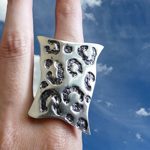 Sterling Silver "Seeing Spots" Faux Leopard Skin Ring. Made in the USA. Hand signed. 1-1/2" x 1" approximately.  *No animals were harmed in the making of this ring*  Meow.