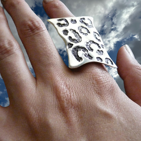 Sterling Silver "Seeing Spots" Faux Leopard Skin Ring. Made in the USA. Hand signed. 1-1/2" x 1" approximately.  *No animals were harmed in the making of this ring*  Meow.
