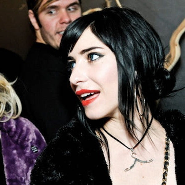 Proudly announce your "hangup" with this beautiful large-scale hanger charm. (Try wearing it with the top resting in the hollow of the neck.) Available in Sterling Silver or Gold Vermeil over Sterling Silver, as shown on this hanger worn by Lisa Origliasso, of The Veronicas. This hanger charm is wonderful worn in the hollow of the collarbone, as a hanger choker necklace and is a great gift for anyone who wears clothes! (And some clothing designers!) Pretty Little Hangup-Sterling Silver Hanger Charm -  Appro
