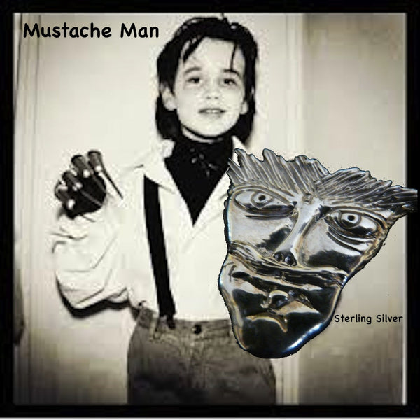 Picture of 8 year old Reeve Carney as an 8 year old Edward Scissorhands for Halloweeen. Another wonderful piece I  designed from a drawing one of my sons when he was only 8 years old. It has that little boy "feistiness" about it!  1--5/16" x 1-1/4" Hand Made in the USA. Hand signed.  Sterling Silver Mustache Man Face-in Pendant or Pin.