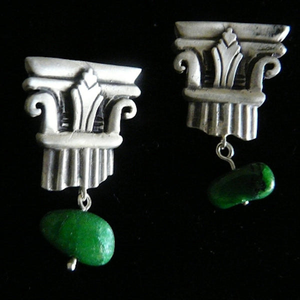 A more delicate version of my Sterling Silver Broken Column earring--THIS one is just the broken TOP, and dangling from it is a chunk of Jade... A more tailored earring for the less bold woman who still likes to make a statement. Perfect for day OR evening wear.   Approximately 1"x 1". Hand made in the USA. Hand signed.  Sterling Silver Broken Column Top Earrings with dangling chunks of Genuine Jade.