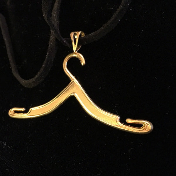 Proudly announce your "hangup" with this beautiful large-scale hanger charm. (Try wearing it with the top resting in the hollow of the neck.) Available in Sterling Silver or Gold Vermeil over Sterling Silver, as shown on this hanger worn by Lisa Origliasso, of The Veronicas. This hanger charm is wonderful worn in the hollow of the collarbone, as a hanger choker necklace and is a great gift for anyone who wears clothes! (And some clothing designers!) Pretty Little Hangup-Sterling Silver Hanger Charm -  Appro