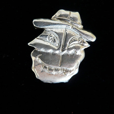 The fourth and final little pendant/pin  designed by my first son, when he was 8 years old and studying art at The Art Student's League in NYC...as part of his 8th birthday-to immortalize his artwork, which I have always loved! Now available for the world!    1-2/16" x 1-1/16" Hand made in the USA. Hand-signed.  Sterling Silver Silly Tooth Man Face based on the drawing of 8 year old Reeve Carney. Pendant or Pin.