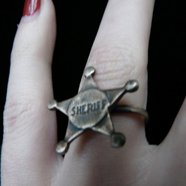 Andy Griffith and Don Knotts as Andy Taylor and Barney Fife with Fablesintheair's Sterling Silver Adjustable Sheriff's Star Ring. For the cowboy or cowgirl in us all. Sterling Silver Sheriff's Star Adkistable Ring. Sheriffs usually keep their stars bright and shining and this whimsical gumball ring is no exception, with a little smudge of oxidization to showcase the detail.