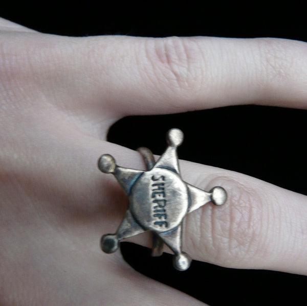 Andy Griffith and Don Knotts as Andy Taylor and Barney Fife with Fablesintheair's Sterling Silver Adjustable Sheriff's Star Ring. For the cowboy or cowgirl in us all. Sterling Silver Sheriff's Star Adkistable Ring. Sheriffs usually keep their stars bright and shining and this whimsical gumball ring is no exception, with a little smudge of oxidization to showcase the detail.