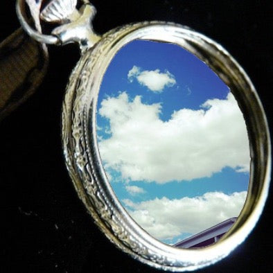 Timeless --Sterling Silver replica of a life size antique etched pocket watch charm open rim, topped by a crown and swinging jump ring. See in it what you will.