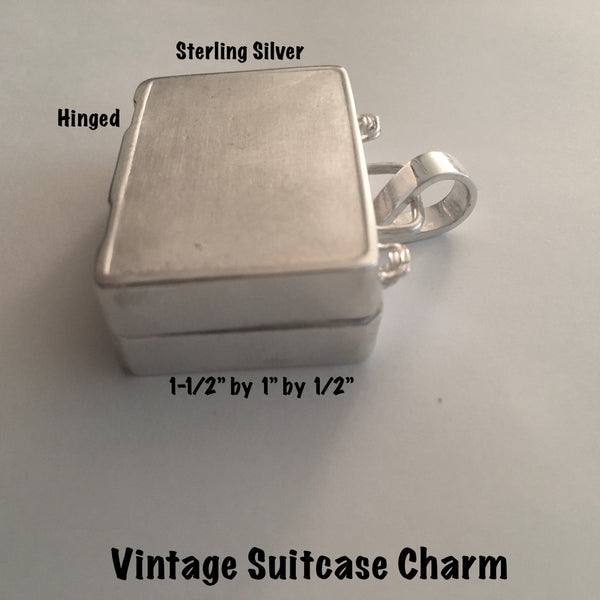 Sterling Silver Vintage Suitcase Charm is a hinged suitcase in which you can tuck an affirmation or scented cotton ball. 