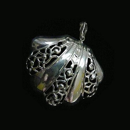 This large openwork scalloped seashell makes a beautiful choker...or, wear it as a single charm on a linked bracelet... for an eye-catching piece of whimsy.  Sterling Silverr Clam on the Half Shell Charm. Handmade in America with love, and hand-sgned. Accompanied by a long leather cord or vintage inspired ribbon. 2-1/2" x 2-1/4" Also available as shoe clip.