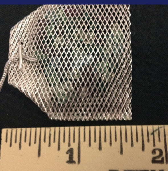 Sterling Silver mesh teabags filled with Austrian Crystals, hanging by a sterling silver foxtail "thread" from a Sterling Silver "Paper" "Crystal Tea" tag.3" x 1-5/8" approximately  Handmade in the USA. Hand Signed