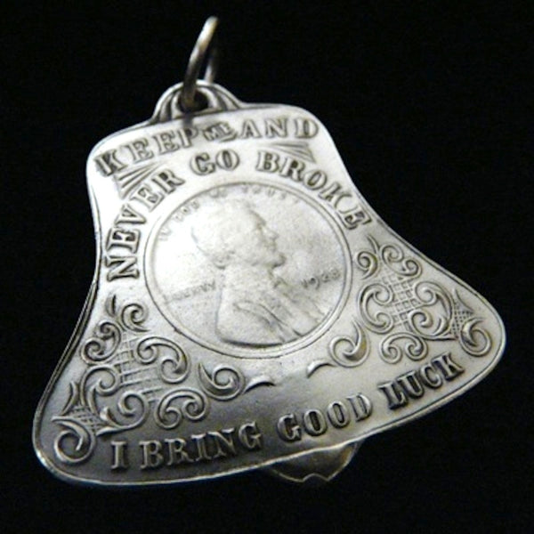 1928. Must have been a great year. Hmmm...not sure what to say about this one. Well, it is POSSIBLE that everyone who owned one of these..I mean, who can tell us otherwise? Remember, folks, these are for entertainment purposes only. (like bubble gum fortunes)  1-5/8" x 1-5/8" Approximately.  Sterling Silver 1928 Lucky Penny Charm comes with black leather cord.